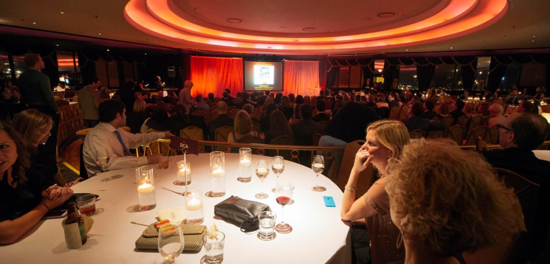 Addy event guests network at a table